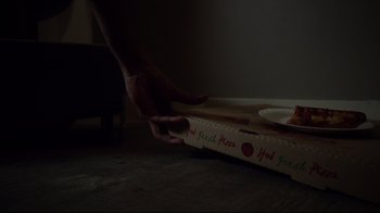 Movie still from “Agents of S.H.I.E.L.D.” (2013), created by Joss Whedon – A person reaching for a piece of pizza in a pizza box; Extreme Close Up shot, Overhead angle