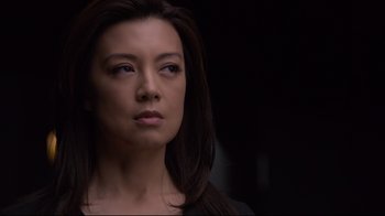 Movie still from “Agents of S.H.I.E.L.D.” (2013), created by Joss Whedon – A person with long dark hair; Close Up shot, Low angle