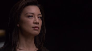 A person with long dark hair