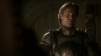 Movie still from “Game of Thrones” (2011), created by D.B. Weiss – A person wearing a suit of armor; Close Up shot, Low angle