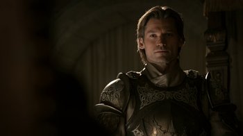 Movie still from “Game of Thrones” (2011), created by D.B. Weiss – A person wearing a suit of armor; Close Up shot, Low angle