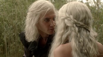 Movie still from “Game of Thrones” (2011), created by D.B. Weiss – A man and a woman looking into each others eyes; Close Up shot, Over the shoulder angle