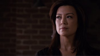 Movie still from “Agents of S.H.I.E.L.D.” (2013), created by Joss Whedon – A person looking at the camera; Close Up shot, Low angle