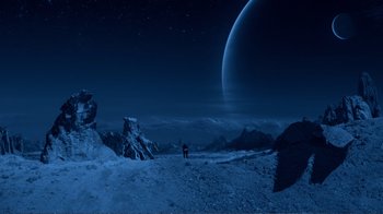 Movie still from “Agents of S.H.I.E.L.D.” (2013), created by Joss Whedon – A person standing on top of a snow covered slope; Extreme Wide shot, High angle