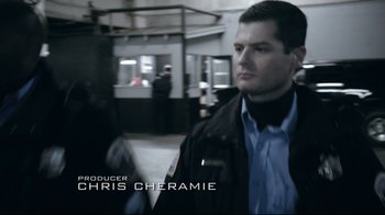 Movie still from “Agents of S.H.I.E.L.D.” (2013), created by Joss Whedon – A person wearing a black jacket; Medium shot, Over the shoulder angle