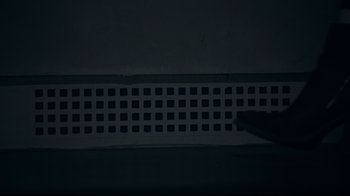 Movie still from “Agents of S.H.I.E.L.D.” (2013), created by Joss Whedon – A cat standing on the side of a building; Extreme Close Up shot, Overhead angle