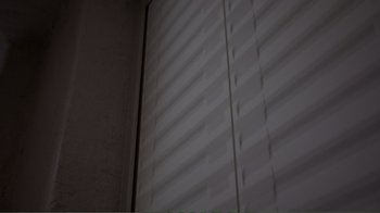 Movie still from “Agents of S.H.I.E.L.D.” (2013), created by Joss Whedon – A white wall with a window and blinds on it; Extreme Close Up shot, Low angle