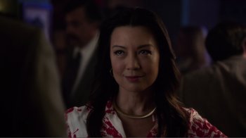 Movie still from “Agents of S.H.I.E.L.D.” (2013), created by Joss Whedon – A person with long hair; Close Up shot, Over the shoulder angle