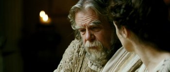 Movie still from “Agora” (2009), directed by Alejandro Amenábar – An older man with a beard and a mustache; Close Up shot, Over the shoulder angle