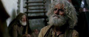 Movie still from “Agora” (2009), directed by Alejandro Amenábar – An old man with long white hair and a beard; Close Up shot, Low angle