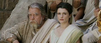 Movie still from “Agora” (2009), directed by Alejandro Amenábar – A man and a woman sitting next to each other; Close Up shot, Low angle