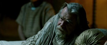 Movie still from “Agora” (2009), directed by Alejandro Amenábar – An old man with a beard and long grey hair; Close Up shot, Over the shoulder angle