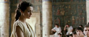 Movie still from “Agora” (2009), directed by Alejandro Amenábar – A woman standing in front of an egyptian mural; Medium shot, Over the shoulder angle