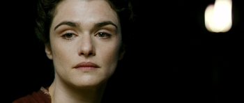 Movie still from “Agora” (2009), directed by Alejandro Amenábar – A woman's face in a dark room; Close Up shot, High angle