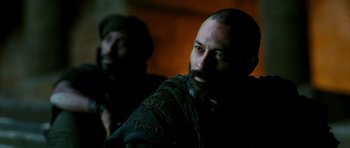 Movie still from “Agora” (2009), directed by Alejandro Amenábar – A man with a goatee and a beard; Close Up shot, Over the shoulder angle