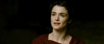 Movie still from “Agora” (2009), directed by Alejandro Amenábar – A person wearing a red shirt; Close Up shot, Over the shoulder angle