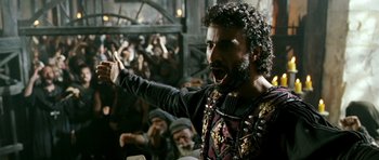 Movie still from “Agora” (2009), directed by Alejandro Amenábar – A man with a beard is yelling at a crowd of onlookers; Medium shot, Low angle