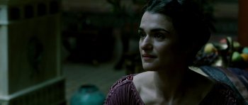 Movie still from “Agora” (2009), directed by Alejandro Amenábar – A person wearing a purple dress; Close Up shot, Over the shoulder angle