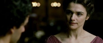 Movie still from “Agora” (2009), directed by Alejandro Amenábar – A person wearing a dress; Close Up shot, Over the shoulder angle