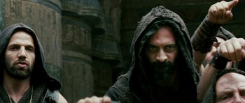 Movie still from “Agora” (2009), directed by Alejandro Amenábar – A man with a beard is wearing a hood; Close Up shot, High angle