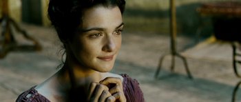 Movie still from “Agora” (2009), directed by Alejandro Amenábar – A person holding a coffee cup; Close Up shot, Over the shoulder angle