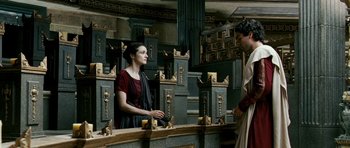 Movie still from “Agora” (2009), directed by Alejandro Amenábar – A woman standing in front of a man in front of a mirror; Medium shot, High angle