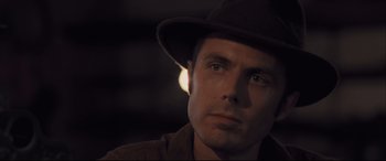 Movie still from “Ain't Them Bodies Saints” (2013), directed by David Lowery – A person wearing a hat; Close Up shot, Low angle