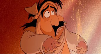 Movie still from “Aladdin” (1992), directed by John Musker – An animated picture of a man with long hair and a beard; Close Up shot, High angle