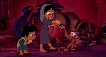 Movie still from “Aladdin” (1992), directed by John Musker – A group of people that are standing in a room; Wide shot, High angle