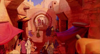 Movie still from “Aladdin” (1992), directed by John Musker – A painting of people walking in the street; Extreme Wide shot, High angle