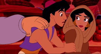 Movie still from “Aladdin” (1992), directed by John Musker – A couple of people that are looking at each other; Medium shot, Over the shoulder angle