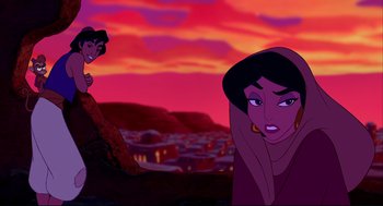 Movie still from “Aladdin” (1992), directed by John Musker – Two animated women in front of a city skyline at sunset; Wide shot, Over the shoulder angle
