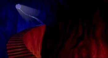 Movie still from “Aladdin” (1992), directed by John Musker – A man riding down the side of a red and blue staircase; Extreme Wide shot, High angle