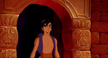 Movie still from “Aladdin” (1992), directed by John Musker – A picture of a person that is in a cave; Medium shot, Over the shoulder angle