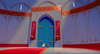 Movie still from “Aladdin” (1992), directed by John Musker – A room with a blue door and red walls; Extreme Wide shot, Low angle