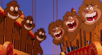 Movie still from “Aladdin” (1992), directed by John Musker – A group of cartoon bears with a party hat on them; Medium shot, Low angle