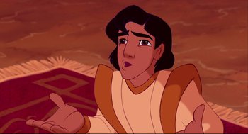 Movie still from “Aladdin” (1992), directed by John Musker – A person with a beard; Close Up shot, Over the shoulder angle