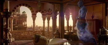 Movie still from “Aladdin” (2019), directed by Guy Ritchie – A living room with a view of a city; Wide shot, High angle