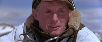 Movie still from “Alaska” (1996), directed by Fraser C. Heston – A person wearing a hat; Close Up shot, Over the shoulder angle