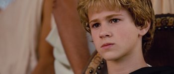 Movie still from “Alexander” (2004), directed by Oliver Stone – A young boy's face; Close Up shot, High angle