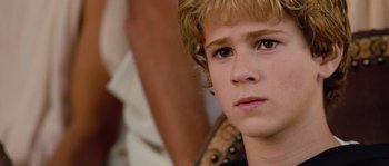Movie still from “Alexander” (2004), directed by Oliver Stone – A young boy's face; Close Up shot, High angle