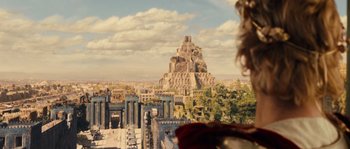 Movie still from “Alexander” (2004), directed by Oliver Stone – An image of an ancient city with a large pyramid in the background; Extreme Wide shot, High angle