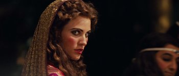 Movie still from “Alexander” (2004), directed by Oliver Stone – A person wearing a costume; Close Up shot, Over the shoulder angle