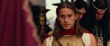 Movie still from “Alexander” (2004), directed by Oliver Stone – A person wearing a costume; Close Up shot, Over the shoulder angle