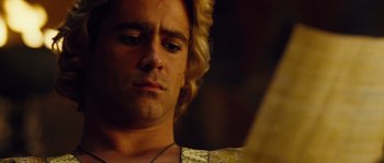 Movie still from “Alexander” (2004), directed by Oliver Stone – A person looking at his reflection in a mirror; Close Up shot, Low angle