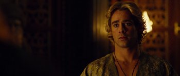 Movie still from “Alexander” (2004), directed by Oliver Stone – A person wearing a yellow shirt; Close Up shot, Over the shoulder angle