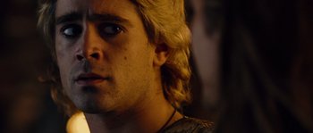 Movie still from “Alexander” (2004), directed by Oliver Stone – A person with long blonde hair; Close Up shot, Low angle