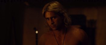 Movie still from “Alexander” (2004), directed by Oliver Stone – A person with long blonde hair; Close Up shot, Over the shoulder angle