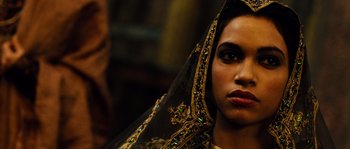 Movie still from “Alexander” (2004), directed by Oliver Stone – A person wearing a veil; Close Up shot, Over the shoulder angle