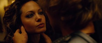 Movie still from “Alexander” (2004), directed by Oliver Stone – A person looking into a mirror; Close Up shot, Over the shoulder angle